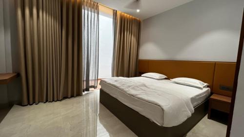 Thalassery Hotel | Cloud Nine Hotel - Kuthuparamba