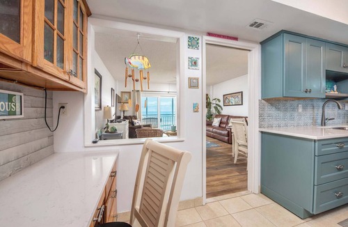South Patrick Shores Apartment | Coastal condo w/balcony views & beach access