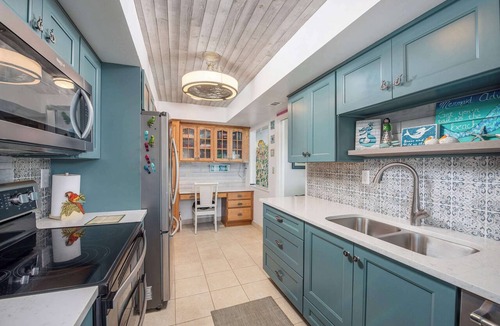 South Patrick Shores Apartment | Coastal condo w/balcony views & beach access