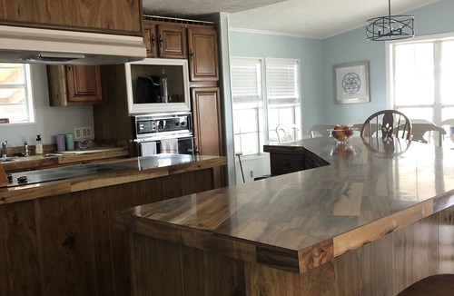 Garden City Cottage | Coastal cottage minutes from the beach. Large front porch for morning sun!