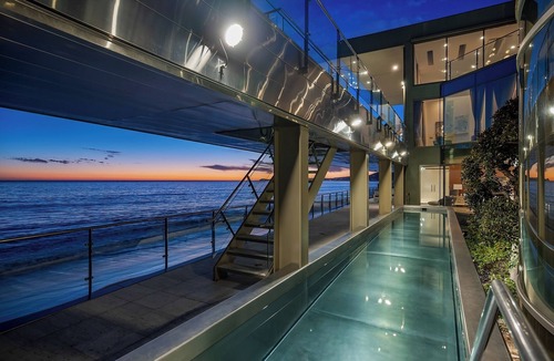 Central Malibu Villa | Coastal Masterpiece with Expansive Beachfront & Luxury Amenities