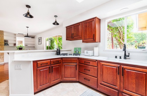 Toro Canyon House | Coastal ranch-style home in garden setting.