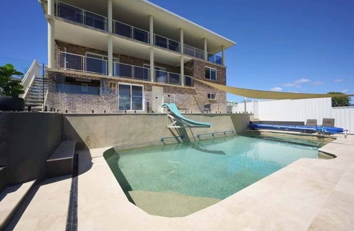 Woolgoolga House | Coastal Retreat with Pool and Balcony Views