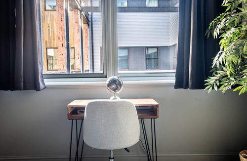 Central City Condo | Cobblestone Chic - WiFi/Downtown/Walk Score 91