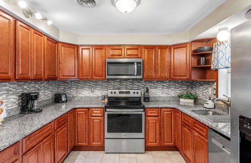 Cocoa Isles House | Cocoa Beach Oasis | Heated Pool + Spa | Outdoor Movie Nights | 4BR Luxury Retreat