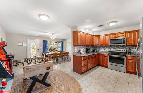 Cocoa Isles House | Cocoa Beach Oasis | Heated Pool + Spa | Outdoor Movie Nights | 4BR Luxury Retreat