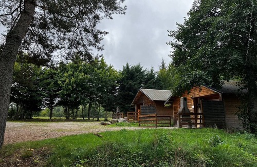 Saint-Bonnet-de-Condat Cabin | Cocooning riverside Chalet on a small campsite in the Heart of Auvergne