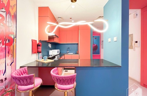 Dubai Sports City Apartment | Colorful Studio with Balcony & City Views