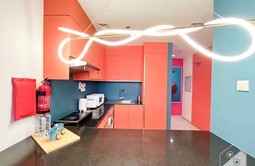 Dubai Sports City Apartment | Colorful Studio with Balcony & City Views