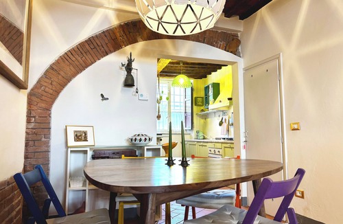 Lucca Historical Center Apartment | Colourful Cave Lucca by TuscanyWeGo