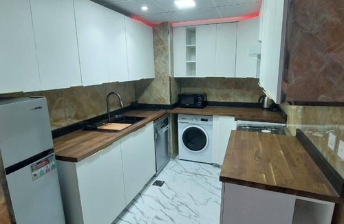 Ras Al Khaimah Apartment | Comfortable 1-bedroom Apartment with king-size bed