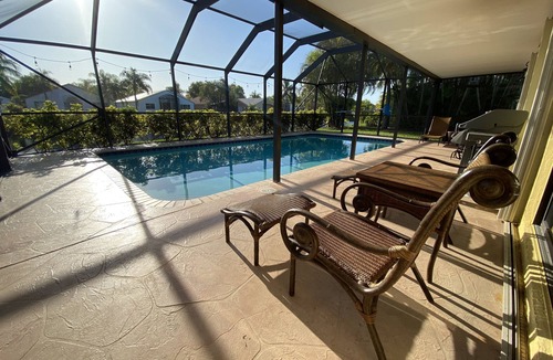 Deerfield Beach House | Comfortable 3-bedroom waterfront villa with heated pool