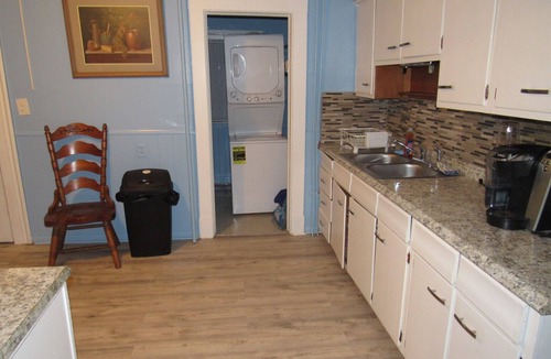 Center House | Comfortable 3BR Home with Parking, Laundry & Workspace