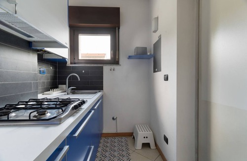 Garegnano Apartment | Comfortable 50m2 flat for 4 people, on the 1st floor with lift.Located in the Certosa area, a neighborhood well connected to the centre, the motorways & the exhibition centres. Nearby is the historic Certosa di Garegnano, famous for its frescoes.On foot