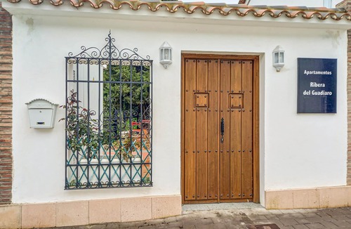 Benaojan Apartment | Comfortable and compact apartment in Ribera del Guadiaro apartment complex with community pool.