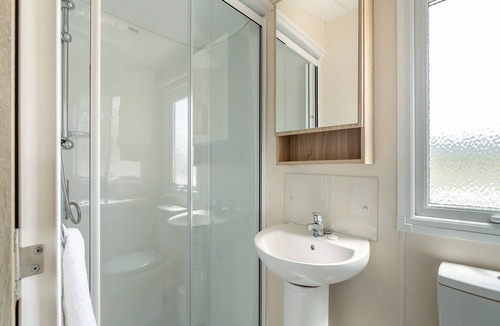 Hewas Water House | Comfortable and spacious caravan with one double and one twin.