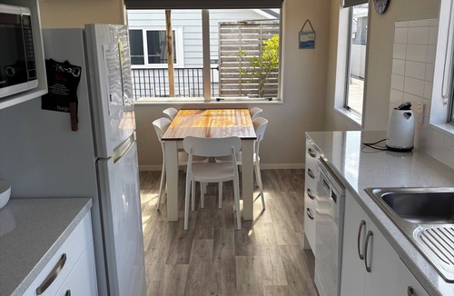 Whangamata House | Comfortable and sunny beach house, close to marina, reserve , wharf and town.