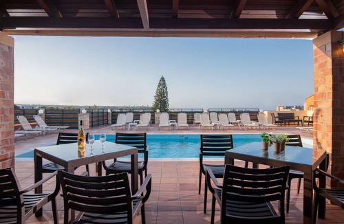 Hersonissos Centre Apartment | Comfortable Apartment with Shared Pool & Beautiful Garden