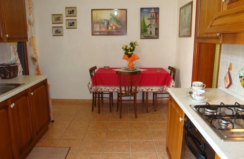 Cala Gonone Apartment | Comfortable apartment, 400 meters from the sea, balcony, in house with garden.