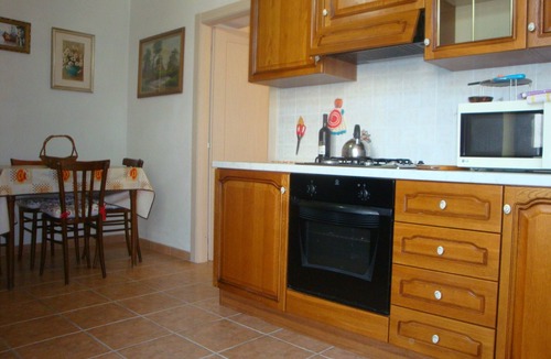 Cala Gonone Apartment | Comfortable apartment, 400 meters from the sea, balcony, in house with garden.