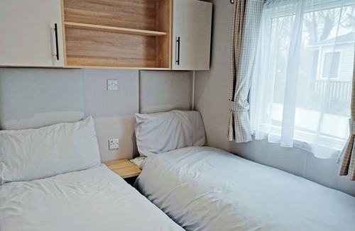 Ryther House | Comfortable caravan with one double with en suite shower room, and one twin.