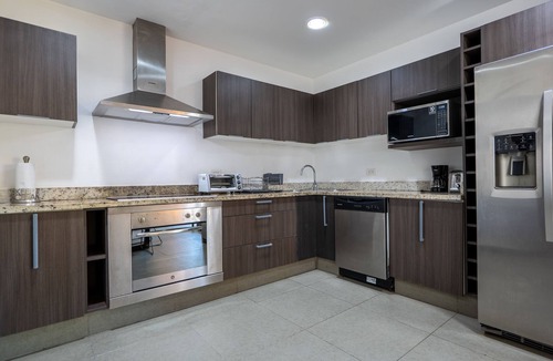 Playacar Fase II Condo | Comfortable family condo with rooftop jetted hot tub, pool & full kitchen