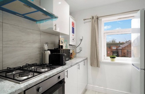 Belvedere Apartment | Comfortable Four-Bedroom Stay with Balcony