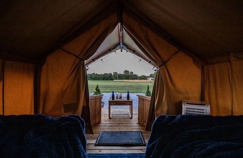 Cassville RV Rental | Comfortable Glamping Tent with Fire Pit and Stream Access Near Mark Twain National Forest in Missouri
