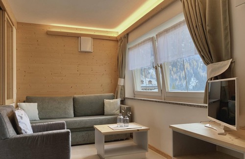 Campitello di Fassa Apartment | Comfortable Apartment “Eurochalet- S5” close to the Ski Lifts with Mountain View, Wi-Fi, Garden & Terrace; Parking Available
