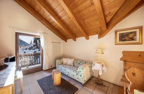 Campitello di Fassa Apartment | Comfortable Apartment “Eurochalet- S2” close to the Ski Lifts with Mountain View, Wi-Fi & Balcony; Parking Available