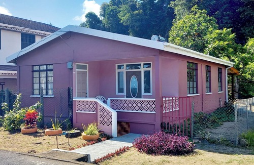 Calibishie House | Comfortable, local home with A/C and private verandah