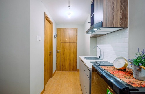 Duren Sawit Apartment | Comfortable Pool View Studio Room at LRT City Jatibening Apartment