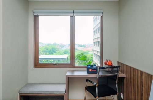 Duren Sawit Apartment | Comfortable Pool View Studio Room at LRT City Jatibening Apartment