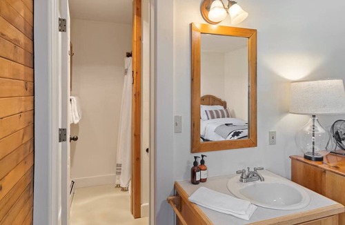 Clark Bed & Breakfast | Comfortable private queen room in the True North Adventure Lodge. Includes a queen bed, private ensuite bathroom, and access to shared amenities like the kitchen, great room, and hot tub. Great for couples or solo travelers.
