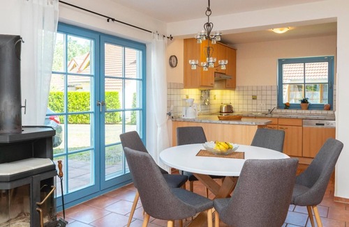 Zingst Apartment | Comfortable semi-detached house with terrace, garden view and pool in Zingst -