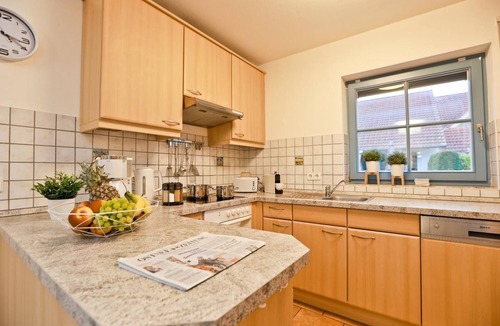 Zingst Apartment | Comfortable semi-detached house with terrace, garden view and pool in Zingst -