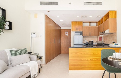 Dubai Production City Apartment | Comfortable Studio at Lago Vista A Dubai Production City by Deluxe Holiday