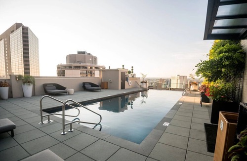 Logan Square Hotel | Comfortable Suite Ideal for Family-Friendly Adventures | Pet-Friendly Stay
