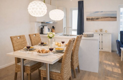 Schillig Apartment | Comfortable vacation home on the beach with balcony, sauna and modern facilities