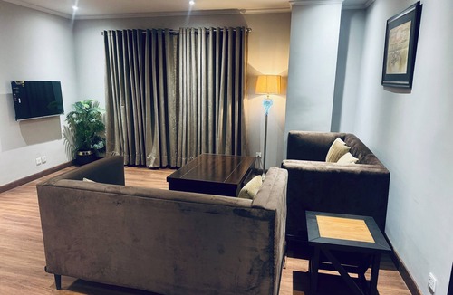 Gulberg Apartment | Comfy and Modern 2BDR apt with Central AC ,Wifi, LED and kitchenette