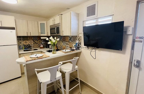Bucana Apartment | Compact Haven with Private Entrance and FREE Parking and Laundry