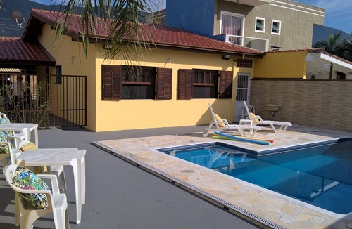 Caraguatatuba House | Cond.P. Patrimonium swimming pool, barbecue, 24h security WI-FI Air Conditioning