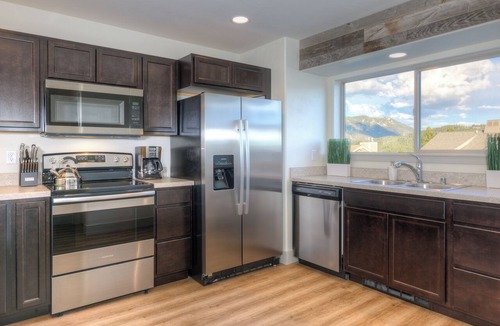 Big Sky Meadow Village Condo | Condo w/private hot tub close to Golf Course & Town Center - Modern Mountain Townhouse