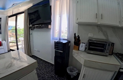 El Batey Condo | Condo with private balcony with pool view