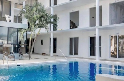 El Batey Condo | Condo with private balcony with pool view