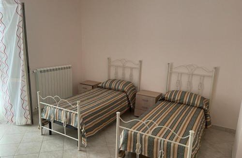 Falerna Apartment | Confortevole e Luminoso Appartamento 100mq a Falerna con Vista sul Paese e sul Promontorio con Free WiFi Free Parking e Smart TV