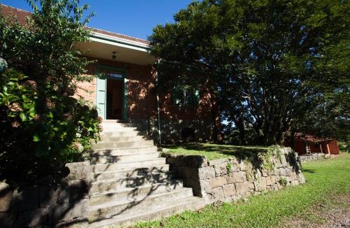 Farroupilha House | Conforto, história e arte - casa com calefação