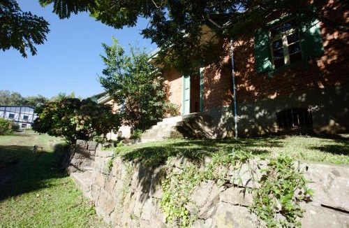 Farroupilha House | Conforto, história e arte - casa com calefação