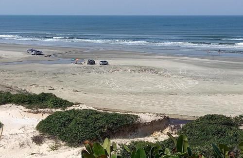 Ilha Comprida House | Conforto Laranja