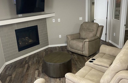 Wisconsin Rapids Apartment | Contemporary 1400 sq ft space in lower level Open concept gas burning fireplace